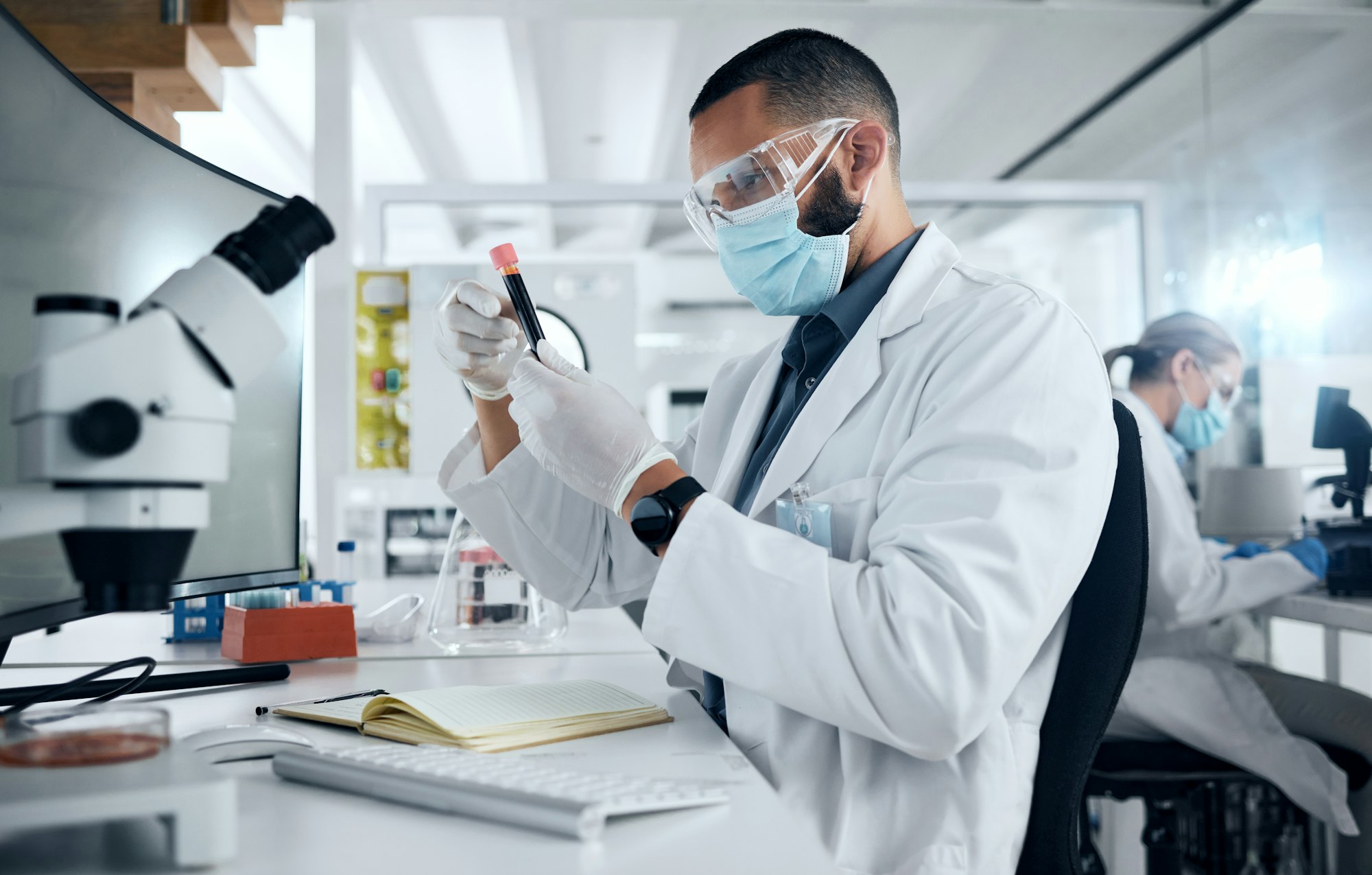 Man, lab and research in science to study dna of virus with PPE for safety, wellness and health. Do